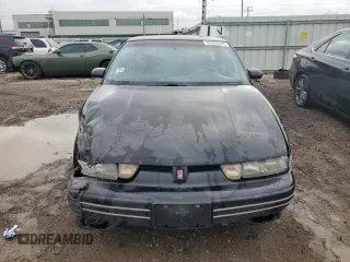 1996 Oldsmobile Cutlass Supreme S z VIN 1G3WH52M5TF374900, wystawiony jako Copart lot #86363644 z przebiegiem 160 137 mil mil oraz Szkody całkowita. Historia ofert i sprzedaży dostępna na DreamBid. Obrazek 5.