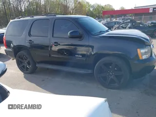 2014 Chevrolet Tahoe LT with VIN 1GNSCBE0XER202150, listed as a IAAI auction lot 41922771 with 168,693 mi miles and . Bid and sale history available at DreamBid. Image 13.