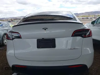 2022 Tesla Model Y Performance with VIN 7SAYGDEF4NF449986, listed as a IAAI auction lot 41754916 with 64,384 mi miles and . Bid and sale history available at DreamBid. Image 17.