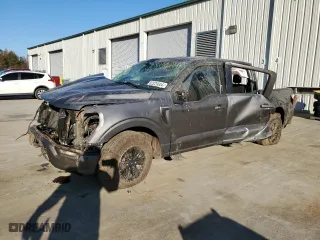 2021 Ford F-150 XL with VIN 1FTEW1CP4MFA68954, listed as a Copart auction lot 82229604 with 58,127 mi miles and Salvage Title. Bid and sale history available at carsss.com. Image 1.