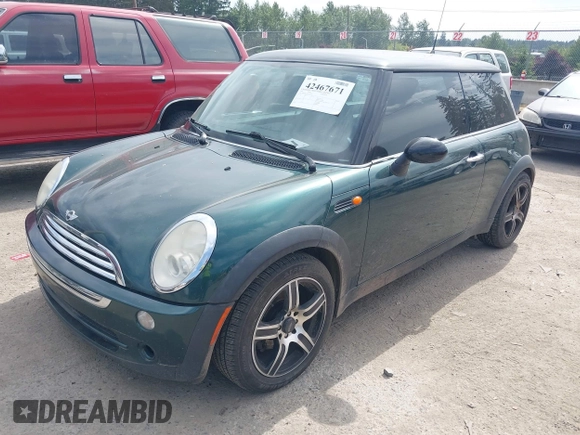 2005 MINI Hardtop with VIN WMWRC334X5TC59101, listed as a IAAI auction lot 42467671 with 180,264 mi miles and . Bid and sale history available at DreamBid. Image 2.