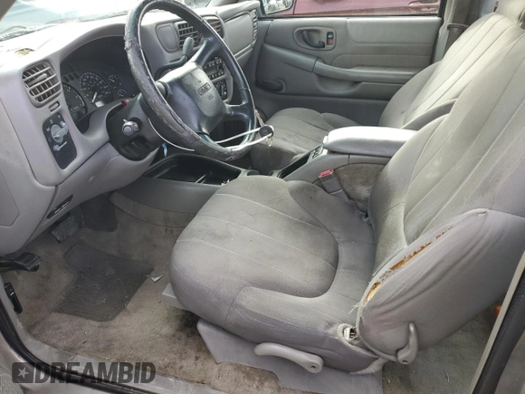 2003 GMC Sonoma with VIN 1GTCS19H638190818, listed as a Copart auction lot 76438274 with 98,901 mi miles and Salvage Title. Bid and sale history available at DreamBid. Image 7.
