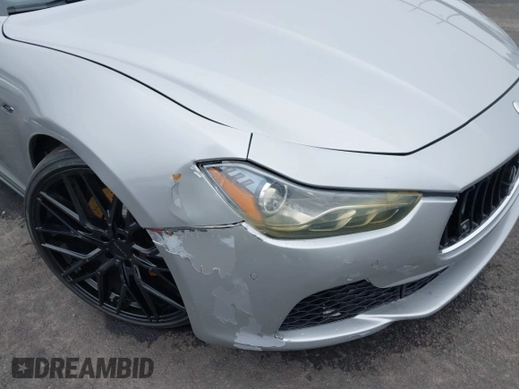 2015 Maserati Ghibli S Q4 with VIN ZAM57RTA2F1146411, listed as a IAAI auction lot 42359547 with 95,937 mi miles and . Bid and sale history available at DreamBid. Image 6.