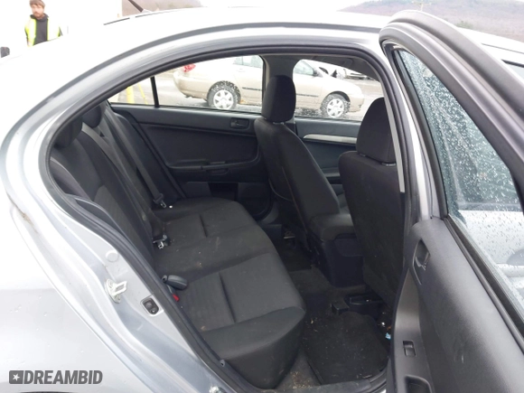 2013 Mitsubishi Lancer SE with VIN JA32V2FW7DU015061, listed as a IAAI auction lot 41863621 with 141,315 mi miles. Bid and sale history available at carsss.com. Image 8.