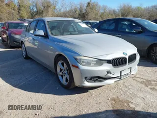 2012 BMW 3 Series 328i with VIN WBA3A5C5XCF345274, listed as a IAAI auction lot 41812072 with 142,024 mi miles. Bid and sale history available at carsss.com. Image 1.