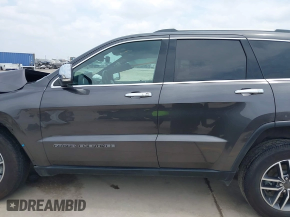 2021 Jeep Grand Cherokee 80th Anniversary with VIN 1C4RJFBG0MC504148, listed as a IAAI auction lot 42063979 with 77,941 mi miles and . Bid and sale history available at DreamBid. Image 15.