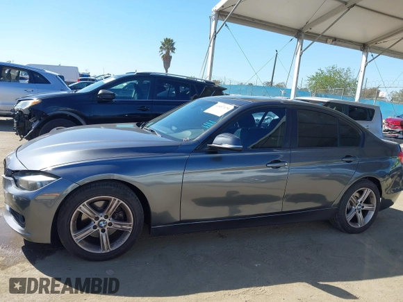 2015 BMW 3 Series 328i with VIN WBA3C1C51FK123852, listed as a IAAI auction lot 41857179 with 90,308 mi miles and . Bid and sale history available at carsss.com. Image 14.