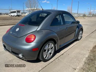 2003 Volkswagen New Beetle Coupe S with VIN 3VWFE21C73M414648, listed as a Copart auction lot 48003495 with 163,317 mi miles and Clean Title. Bid and sale history available at carsss.com. Image 4.