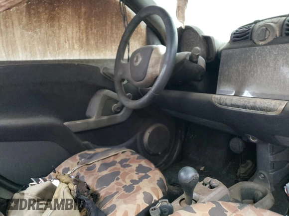 2012 Smart fortwo Pure z VIN WMEEJ3BA6CK567723, wystawiony jako Copart lot #43143065 z przebiegiem Nie podano mil oraz Szkody całkowita. Historia ofert i sprzedaży dostępna na DreamBid. Obrazek 9.