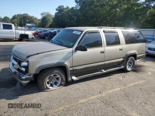 1999 Chevrolet Suburban with VIN 1GNEC16R9XJ490863, listed as a Copart auction lot 65938594 with 176,391 mi miles and Salvage Title. Bid and sale history available at carsss.com. Image 1.