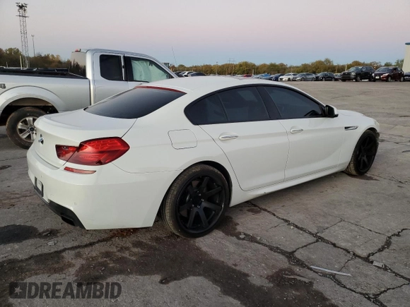 2014 BMW 6 Series 650i z VIN WBA6B2C54ED128858, wystawiony jako Copart lot #79132084 z przebiegiem 29 244 mil mil oraz Szkoda całkowita • Salvage title. Historia ofert i sprzedaży dostępna na DreamBid. Obrazek 3.
