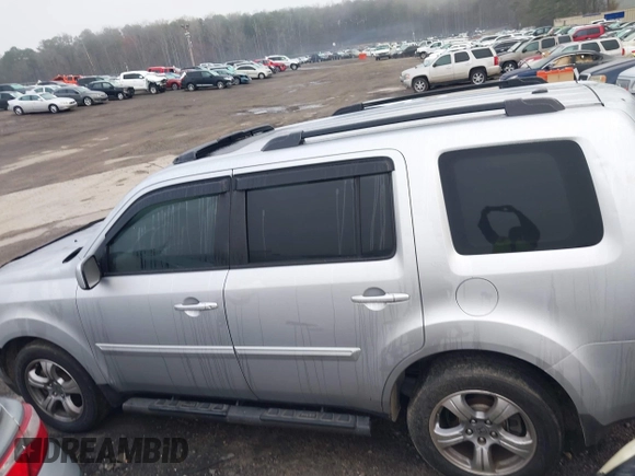 2013 Honda Pilot EX-L with VIN 5FNYF3H75DB012205, listed as a IAAI auction lot 41797084 with 181,577 mi miles and . Bid and sale history available at DreamBid. Image 14.