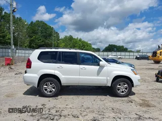 2005 Lexus GX 470 z VIN JTJBT20X350075577, wystawiony jako IAAI lot #42534615 z przebiegiem 233 329 mil mil oraz . Historia ofert i sprzedaży dostępna na DreamBid. Obrazek 13.