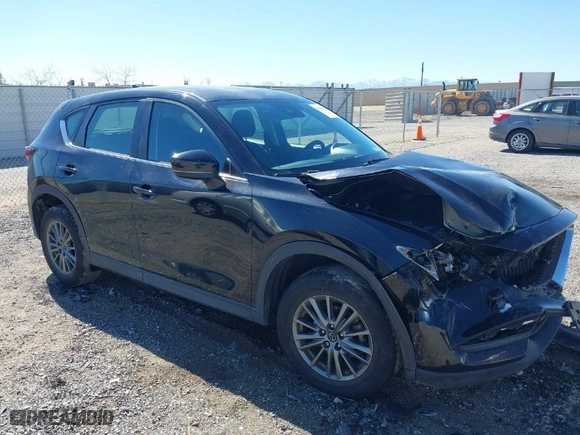 2017 Mazda CX-5 Sport with VIN JM3KFBBL2H0144792, listed as a IAAI auction lot 41654031 with 77,107 mi miles. Bid and sale history available at carsss.com. Image 1.