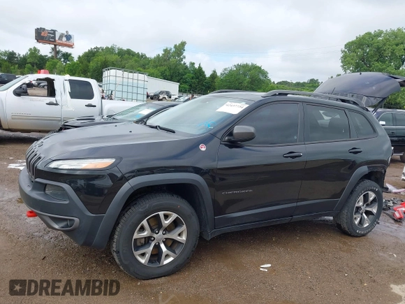 2015 Jeep Cherokee Trailhawk with VIN 1C4PJMBS5FW647601, listed as a IAAI auction lot 42437734 with 170,640 mi miles and . Bid and sale history available at DreamBid. Image 15.