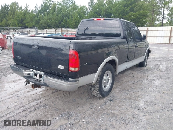 2003 Ford F-150 XL with VIN 1FTRX17L13NA01819, listed as a IAAI auction lot 42719787 with Not provided miles and . Bid and sale history available at DreamBid. Image 4.