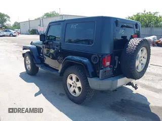 2009 Jeep Wrangler Sahara with VIN 1J4FA541X9L763737, listed as a IAAI auction lot 42721115 with 166,663 mi miles and . Bid and sale history available at DreamBid. Image 3.