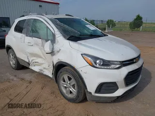 2021 Chevrolet Trax LT with VIN KL7CJLSB7MB329750, listed as a IAAI auction lot 42344585 with 98,315 mi miles and . Bid and sale history available at DreamBid. Image 1.