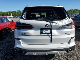 2025 BMW X5 xDrive40i z VIN 5UX23EU08S9Z95423, wystawiony jako Copart lot #55777635 z przebiegiem 695 mil mil oraz Szkoda całkowita • Salvage title. Historia ofert i sprzedaży dostępna na DreamBid. Obrazek 6.