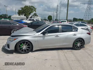 2014 Infiniti Q50 Sport с VIN JN1BV7ARXEM694019, выставлен на аукционе IAAI как лот 42182390 с пробегом 65 904 миль миль и . История ставок и продаж доступна на DreamBid. Изображение 14.