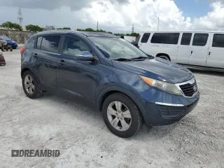 2012 Kia Sportage LX z VIN KNDPB3A29C7240993, wystawiony jako Copart lot #61408165 z przebiegiem 171 453 mil mil oraz Czysty tytuł • Clean title. Historia ofert i sprzedaży dostępna na DreamBid. Obrazek 4.