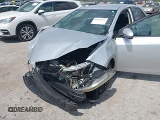 2014 Toyota Corolla L with VIN 5YFBURHE9EP160912, listed as a IAAI auction lot 42159372 with 125,863 mi miles and . Bid and sale history available at DreamBid. Image 19.
