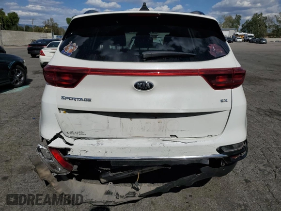 2020 Kia Sportage EX z VIN KNDPNCAC0L7805972, wystawiony jako Copart lot #52038825 z przebiegiem 65 794 mil mil oraz Szkoda całkowita • Salvage title. Historia ofert i sprzedaży dostępna na DreamBid. Obrazek 6.
