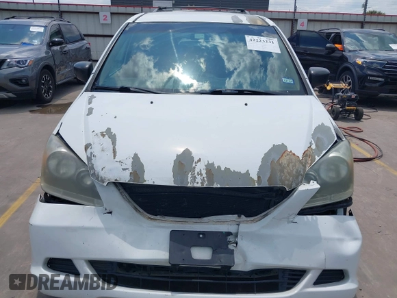 2007 Honda Odyssey LX with VIN 5FNRL382X7B135892, listed as a IAAI auction lot 42223231 with 204,054 mi miles and . Bid and sale history available at DreamBid. Image 13.