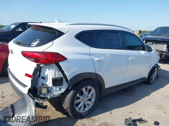2021 Hyundai Tucson Value with VIN KM8J33A42MU314290, listed as a IAAI auction lot 41986298 with 32,740 mi miles and . Bid and sale history available at DreamBid. Image 4.