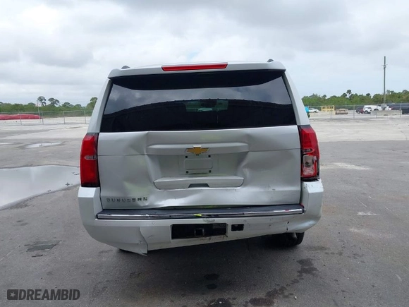 2016 Chevrolet Suburban LTZ with VIN 1GNSKJKCXGR166782, listed as a IAAI auction lot 41562200 with NaN miles. Bid and sale history available at carsss.com. Image 16.