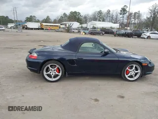 2003 Porsche Boxster S с VIN WP0CB29853U662035, выставлен на аукционе IAAI как лот 41845536 с пробегом 42 026 миль миль и . История ставок и продаж доступна на DreamBid. Изображение 13.