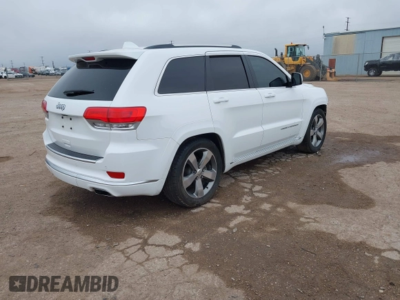 2015 Jeep Grand Cherokee Summit with VIN 1C4RJFJT3FC662422, listed as a IAAI auction lot 41447645 with 109,540 mi miles. Bid and sale history available at carsss.com. Image 4.
