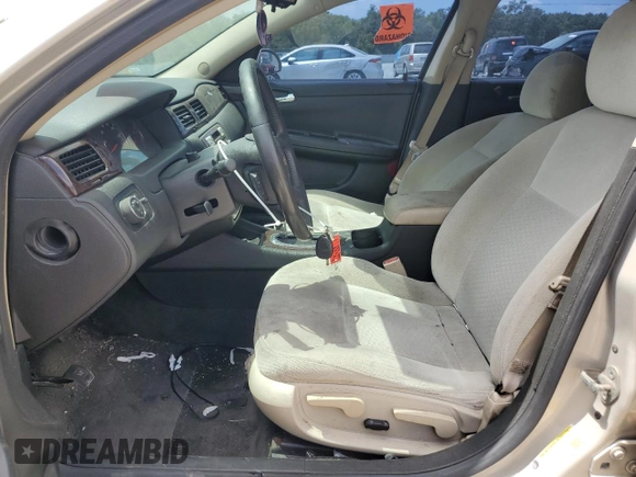 2012 Chevrolet Impala LT Retail with VIN 2G1WB5E32C1107055, listed as a Copart auction lot 53727135 with 219,249 mi miles and Salvage Title. Bid and sale history available at DreamBid. Image 7.