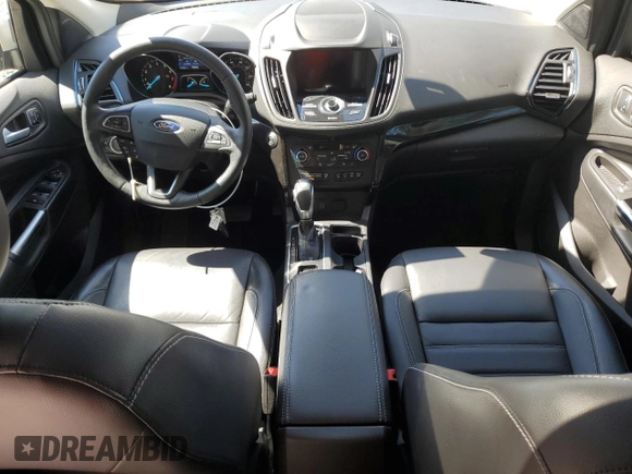 2019 Ford Escape Titanium with VIN 1FMCU9J97KUA21390, listed as a Copart auction lot 57640175 with 51,254 mi miles and Salvage title. Bid and sale history available at DreamBid. Image 8.