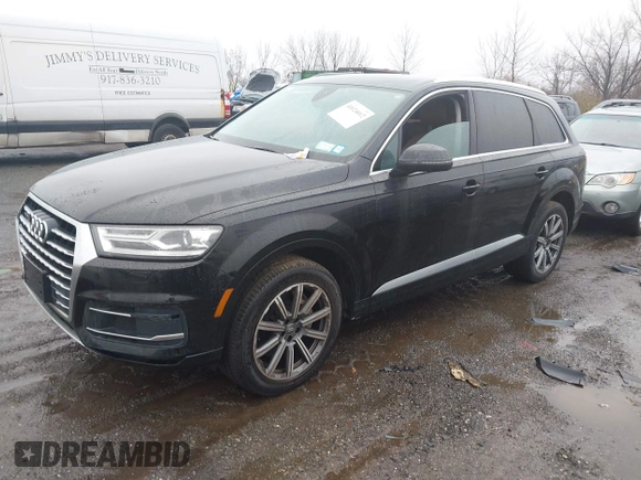2019 Audi Q7 Premium with VIN WA1AHAF74KD029904, listed as a IAAI auction lot 41024012 with 79,896 mi miles and . Bid and sale history available at DreamBid. Image 17.