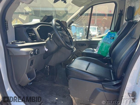 2021 Ford Transit Cargo with VIN 1FTBR1C81MKA05708, listed as a IAAI auction lot 42762772 with 67,631 mi miles and . Bid and sale history available at DreamBid. Image 15.
