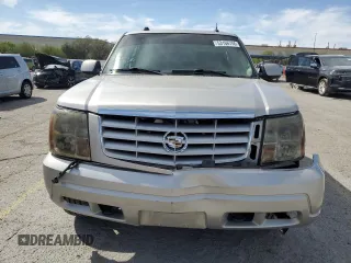 2004 Cadillac Escalade z VIN 1GYEC63T44R235759, wystawiony jako Copart lot #53166755 z przebiegiem 212 034 mil mil oraz Szkody całkowita. Historia ofert i sprzedaży dostępna na DreamBid. Obrazek 5.