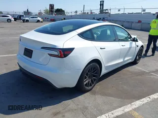 2025 Tesla Model 3 Long Range with VIN 5YJ3E1EA4SF903567, listed as a IAAI auction lot 42453246 with 19,365 mi miles and . Bid and sale history available at DreamBid. Image 4.