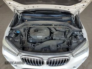 2016 BMW X1 xDrive28i z VIN WBXHT3C35GP881610, wystawiony jako Copart lot #57690625 z przebiegiem 189 579 mil mil oraz Czysty tytuł • Clean title. Historia ofert i sprzedaży dostępna na DreamBid. Obrazek 11.