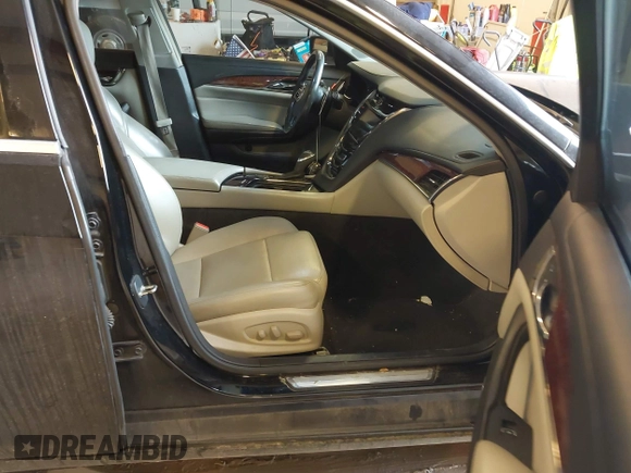 2014 Cadillac CTS Luxury AWD with VIN 1G6AX5SX2E0195357, listed as a IAAI auction lot 41677831 with 152,567 mi miles and . Bid and sale history available at DreamBid. Image 5.