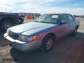 2005 Mercury Grand Marquis LS Premium with VIN 2MEFM75W75X664470, listed as a IAAI auction lot 41960637 with 191,600 mi miles. Bid and sale history available at carsss.com. Image 2.