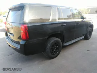 2017 Chevrolet Tahoe Commercial with VIN 1GNLCDEC0HR223538, listed as a IAAI auction lot 41501555 with 105,031 mi miles. Bid and sale history available at carsss.com. Image 4.