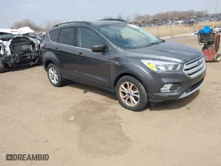 2018 Ford Escape SE with VIN 1FMCU0GD0JUA11984, listed as a IAAI auction lot 42082620 with 85,997 mi miles. Bid and sale history available at carsss.com. Image 1.