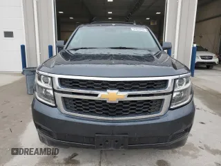 2019 Chevrolet Tahoe LT with VIN 1GNSKBKCXKR212450, listed as a Copart auction lot 54433205 with 119,907 mi miles and Salvage title. Bid and sale history available at DreamBid. Image 5.