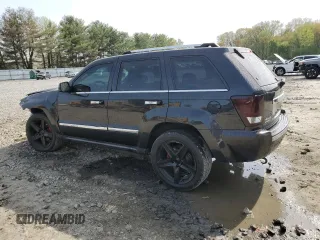 2010 Jeep Grand Cherokee Limited with VIN 1J4RR5GT2AC150518, listed as a Copart auction lot 54101275 with 135,851 mi miles and Salvage title. Bid and sale history available at DreamBid. Image 2.