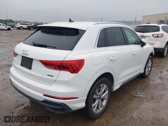 2023 Audi Q3 S line Premium with VIN WA1DECF35P1127797, listed as a IAAI auction lot 41353532 with 34,581 mi miles and . Bid and sale history available at DreamBid. Image 4.