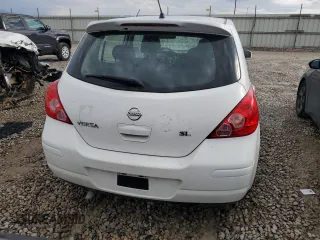 2009 Nissan Versa S z VIN 3N1BC13E89L383363, wystawiony jako Copart lot #72003164 z przebiegiem 104 953 mil mil oraz Szkoda całkowita • Salvage title. Historia ofert i sprzedaży dostępna na DreamBid. Obrazek 6.