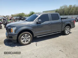 2018 Ford F-150 XL with VIN 1FTEW1CG6JKF80184, listed as a Copart auction lot 62591095 with 60,929 mi miles and Salvage title. Bid and sale history available at DreamBid. Image 1.