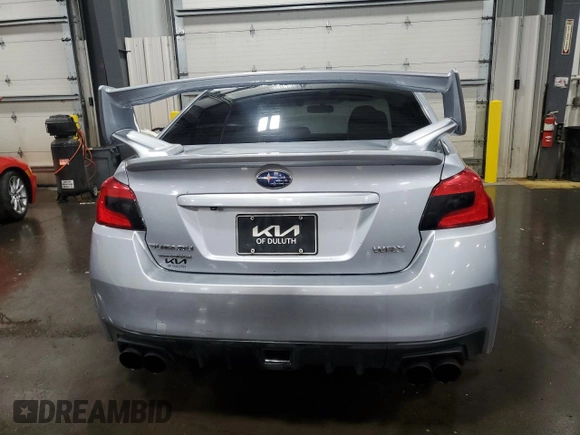2016 Subaru WRX z VIN JF1VA1B67G9823319, wystawiony jako Copart lot #56790565 z przebiegiem 150 603 mil mil oraz Szkoda całkowita • Salvage title. Historia ofert i sprzedaży dostępna na DreamBid. Obrazek 6.