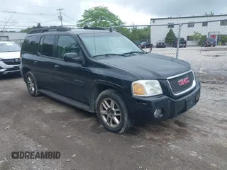 2006 GMC Envoy Denali z VIN 1GKET66M166102444, wystawiony jako IAAI lot #42538819 z przebiegiem Nie podano mil oraz . Historia ofert i sprzedaży dostępna na DreamBid. Obrazek 1.